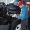 Man servicing engine of semi